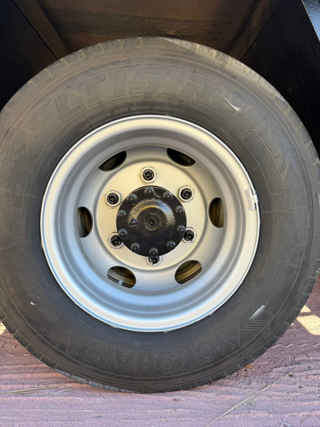 The same truck wheel coated silver with the hub and nuts picked out in black, tyre masked