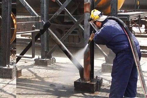 Structural steel, blasted to spec Structural steel being abrasive blasted on an industrial site in Western Australia