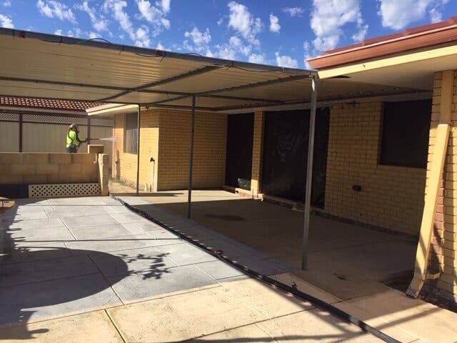 Painted brick wall stripped back to clean face brick in Perth