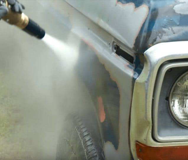 Bonnet, mid-pass Wet abrasive blasting lifting old enamel and primer off a car bonnet