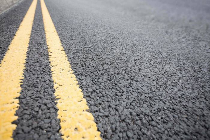 Line marking blasted off asphalt without scarring the surface